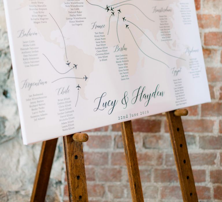 World map inspired table plan for wedding