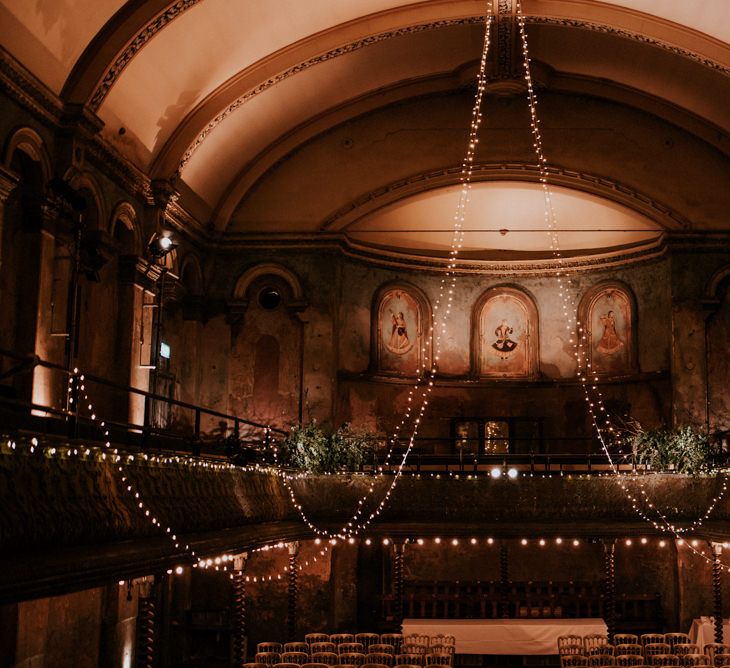 Mezzanine at Wilton's Music Hall with Hanging Fairy Lights Decor