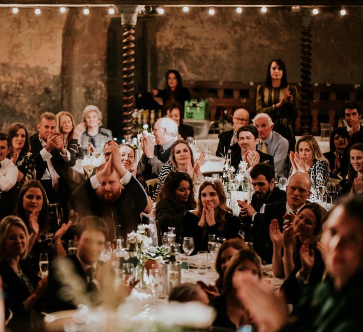 Wedding Guests Clapping at Wilton's Music Hall