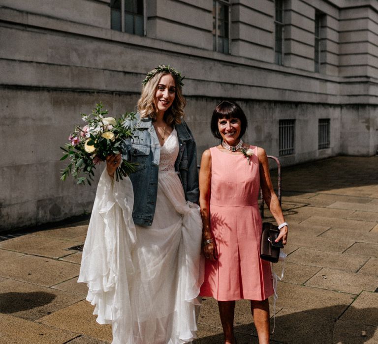 Bride and wedding guest at micro wedding