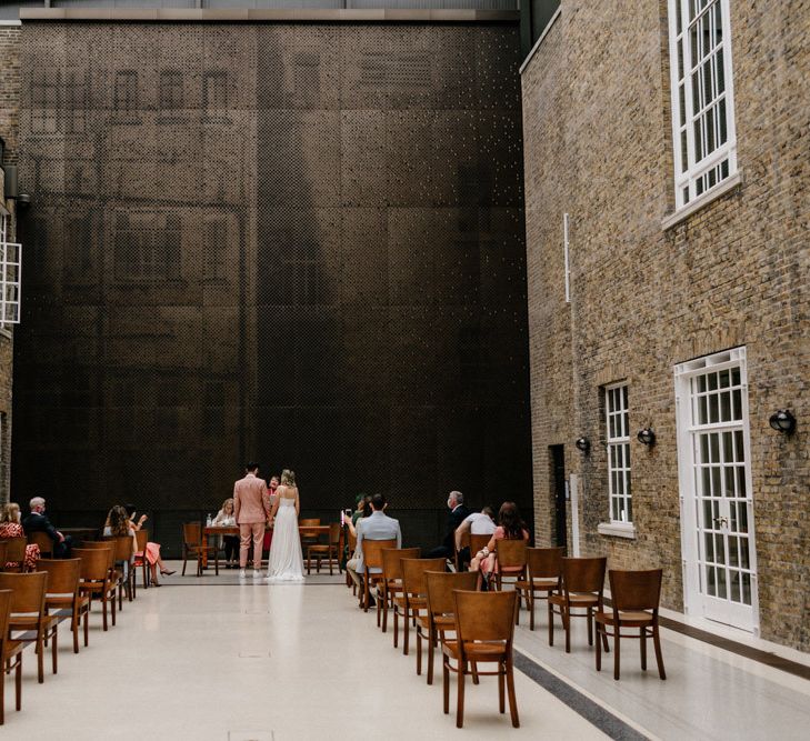 intimate wedding ceremony in the roofed atria at Hackney Town Hall