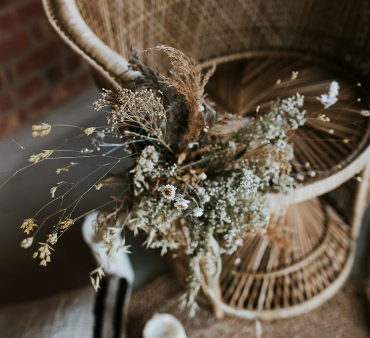 Peacock Chair with Dried Flowers Bouquet