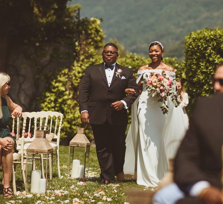 Outdoor wedding ceremony bridal entrance