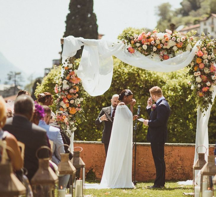 Bride and groom exchanging vows at Lake Como wedding