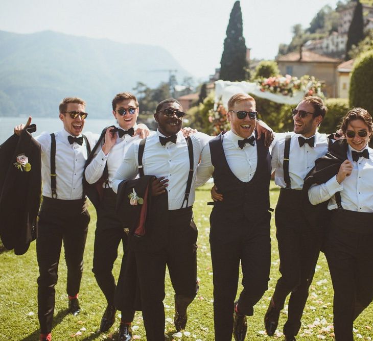 Groomsmen in braces and bow ties