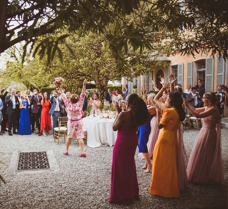 Bouquet toss at Lake Como wedding