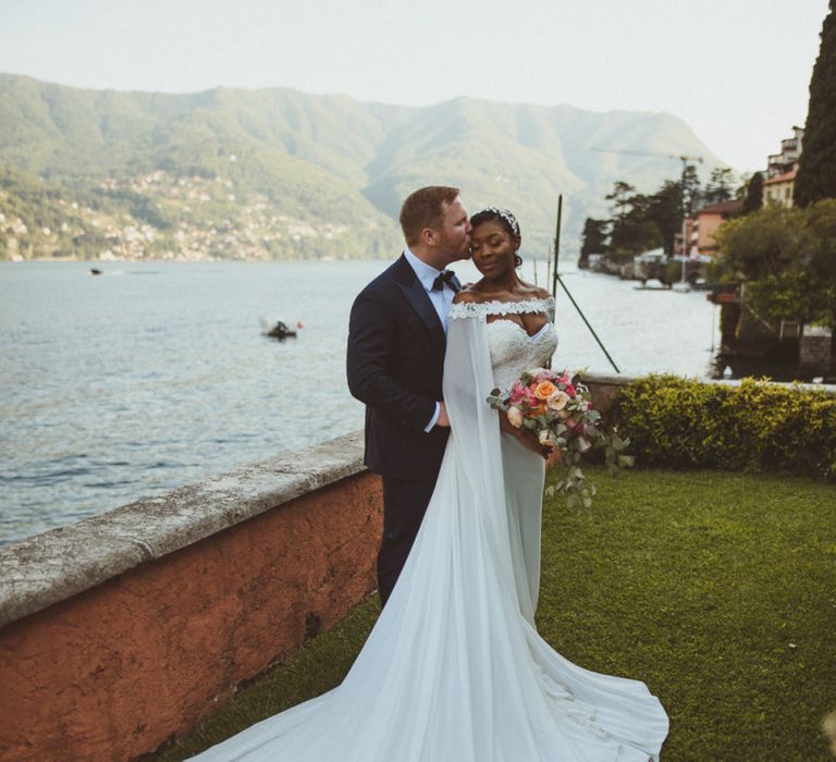 Bride and groom portrait with Lake Como backdrop