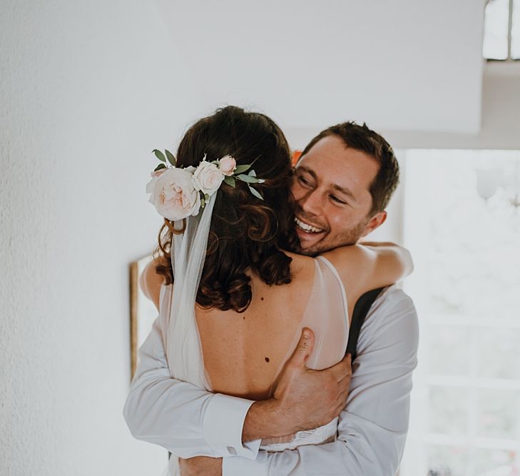 Bridal Morning Preparations. Tipi Wedding at Home, Cumbria. Pale Dusky Pink, White and Mocha Flowers, Handwritten Details and Festoon Lights. Bride wears Essence of Australia Dress from Angelica Bridal. Groom wears Olive Next Suit and Tan Office Shoes.