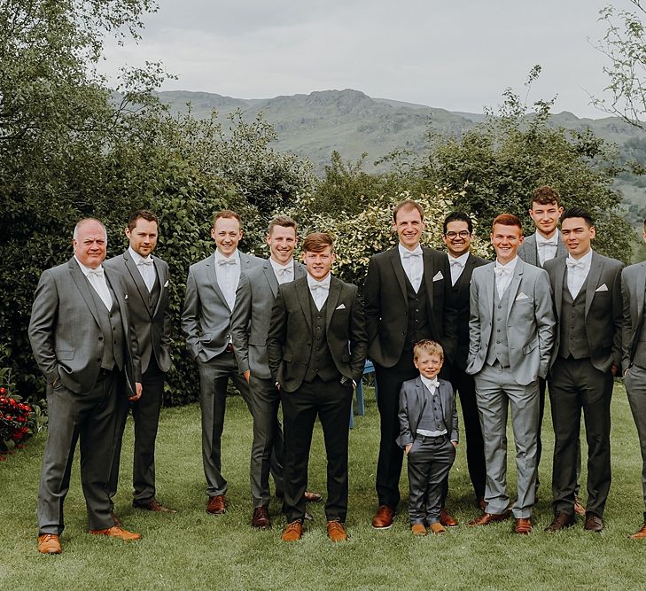 Tipi Wedding at Home, Cumbria. Pale Dusky Pink, White and Mocha Flowers, Handwritten Details and Festoon Lights. Bride wears Essence of Australia Dress from Angelica Bridal. Groom wears Olive Next Suit and Tan Office Shoes.