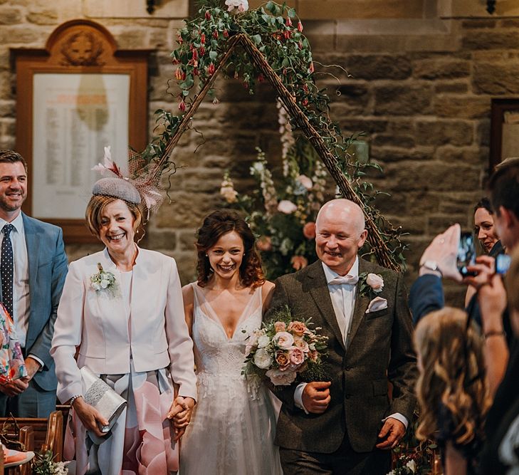 Florals by Mother of the Bride at Abundance Flowers and The Real Flower Company . Tipi Wedding at Home, Cumbria. Pale Dusky Pink, White and Mocha Flowers, Handwritten Details and Festoon Lights. Bride wears Essence of Australia Dress from Angelica Bridal. Groom wears Olive Next Suit and Tan Office Shoes.