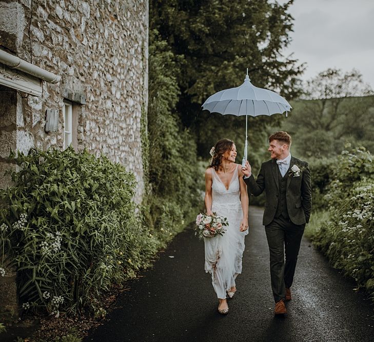 Florals by Mother of the Bride at Abundance Flowers and The Real Flower Company. Tipi Wedding at Home, Cumbria. Pale Dusky Pink, White and Mocha Flowers, Handwritten Details and Festoon Lights. Bride wears Essence of Australia Dress from Angelica Bridal. Groom wears Olive Next Suit and Tan Office Shoes.