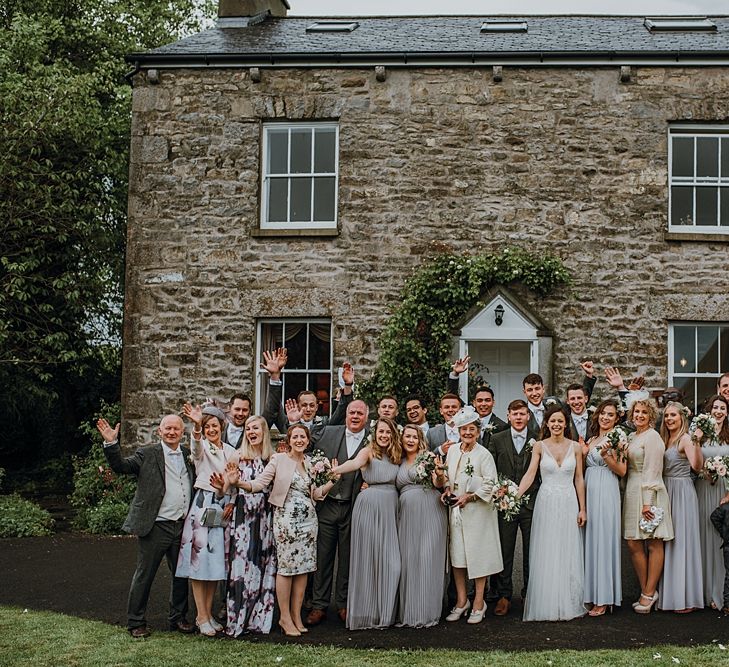 Group Shots. Tipi Wedding at Home, Cumbria. Pale Dusky Pink, White and Mocha Flowers, Handwritten Details and Festoon Lights. Bride wears Essence of Australia Dress from Angelica Bridal. Groom wears Olive Next Suit and Tan Office Shoes.