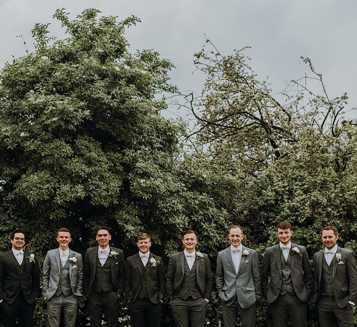 Group Shots. Tipi Wedding at Home, Cumbria. Pale Dusky Pink, White and Mocha Flowers, Handwritten Details and Festoon Lights. Bride wears Essence of Australia Dress from Angelica Bridal. Groom wears Olive Next Suit and Tan Office Shoes.