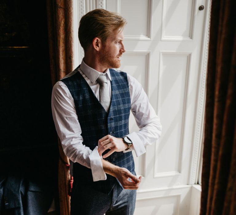 Groom Getting Ready in Bespoke Alton Lane Suit with Check Waistcoat