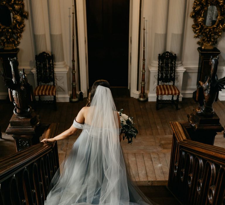 Bride in Tulle Custom Made Blue Claire La Faye Wedding Dress Walking Down The Stairs