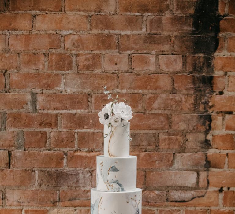 Four Tier Wedding Cake with Blue &amp; Gold Geode Decor