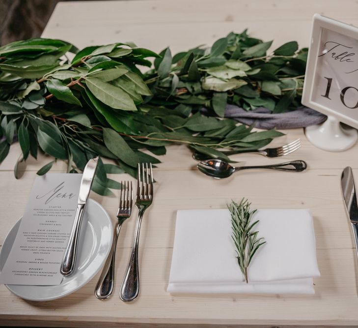 White and Green Table Decor with Greenery Garland