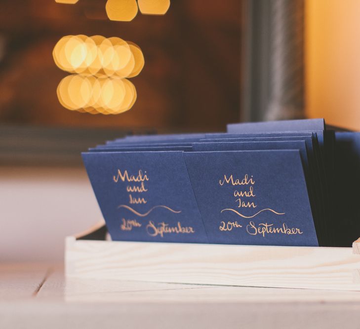 Wedding stationery in navy and copper