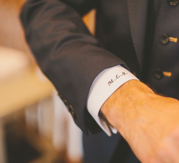 Personalised wedding suit with hand stitched initials