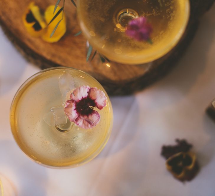 Champagne wedding drinks with floral detail