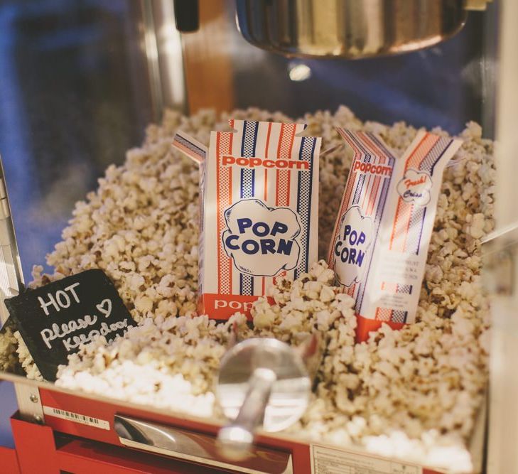 Popcorn at rustic barn wedding with DIY decor