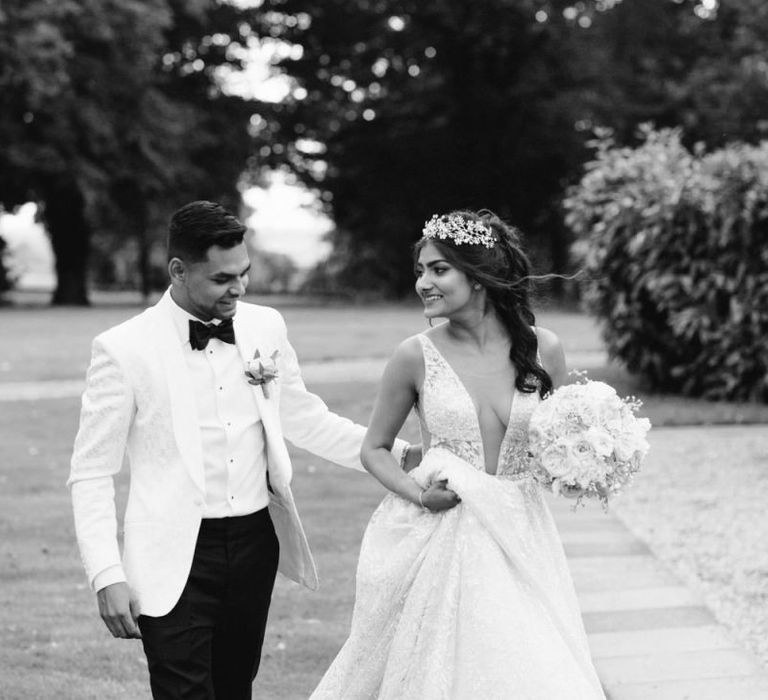 Black and white bride and groom portrait with bride in Berta Bridal gown