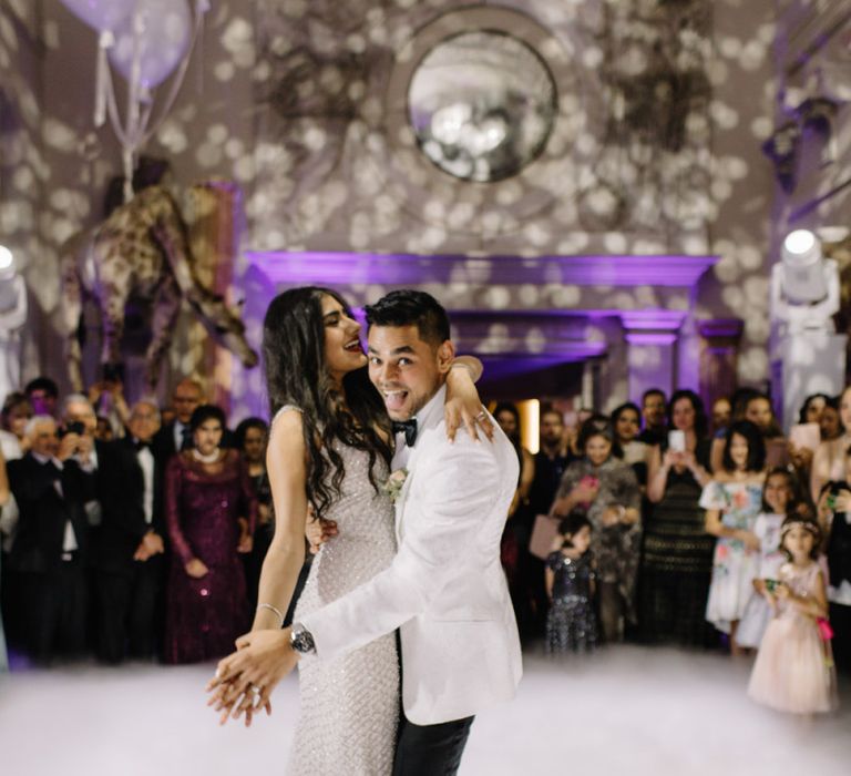 Bride and groom first dance at black-tie Aynhoe Park wedding