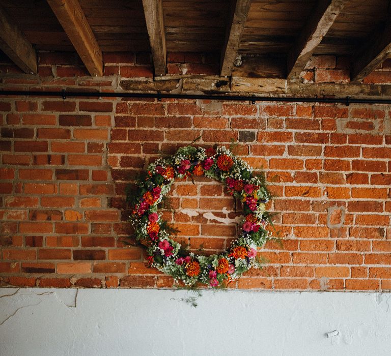 Floral Wreath Altar | Rustic Bureau | Persian Rugs and Autumn Leaves Lining Aisle | Mariachi Band and Persian Rug Aisle for Autumn Wedding | Leah Lombardi Weddings