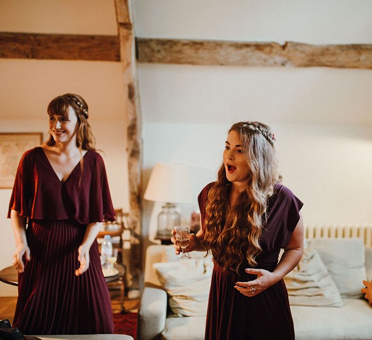 Bridesmaids in Mismatched Maroon Dresses from High Street | Mariachi Band and Persian Rug Aisle for Autumn Wedding | Leah Lombardi Weddings