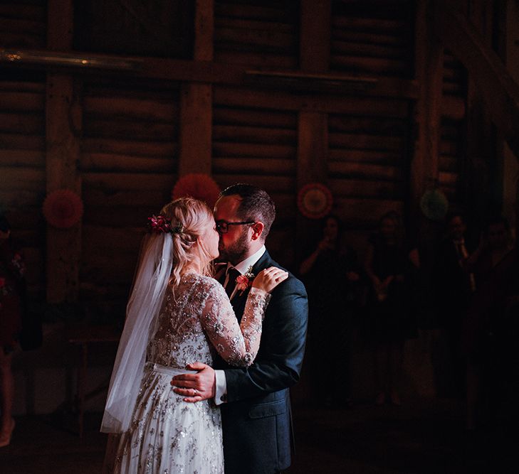 Bride in Bead Embellished Needle &amp; Thread Gown with Cascading Tulle Skirt and Semi-Sheer Sleeves | Elbow Length Veil | Bridal Up Do with Pink Hair Flowers | Groom in Check Blue Three-Piece Suit by T.M.Lewin with Maroon Tie and Pocket Square | First Dance | Paper Fans | Mariachi Band and Persian Rug Aisle for Autumn Wedding | Leah Lombardi Weddings