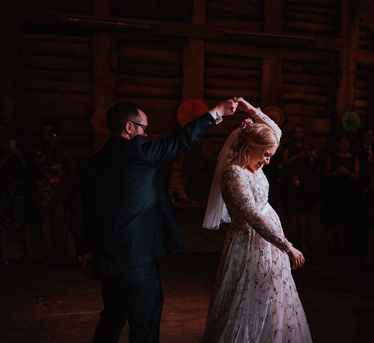 Bride in Bead Embellished Needle &amp; Thread Gown with Cascading Tulle Skirt and Semi-Sheer Sleeves | Elbow Length Veil | Bridal Up Do with Pink Hair Flowers | Groom in Check Blue Three-Piece Suit by T.M.Lewin with Maroon Tie and Pocket Square | First Dance | Paper Fans | Mariachi Band and Persian Rug Aisle for Autumn Wedding | Leah Lombardi Weddings