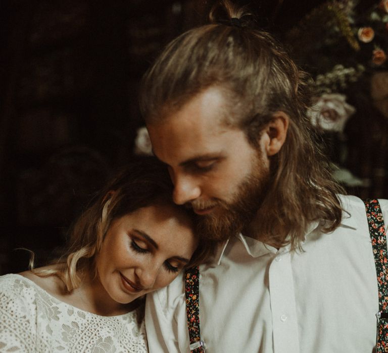 Boho Bride and Groom Embracing