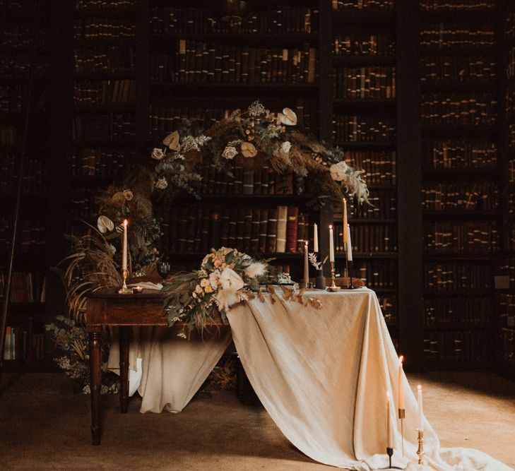 Sweetheart Table in Portico Library with Dried Flower Moon Gate  Backdrop