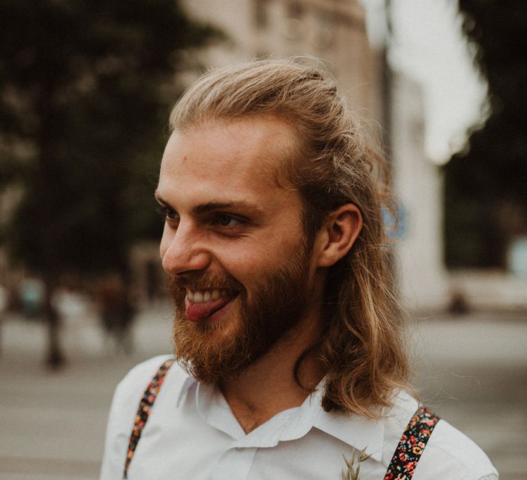 Boho Groom with Top Knot in in Floral Braces