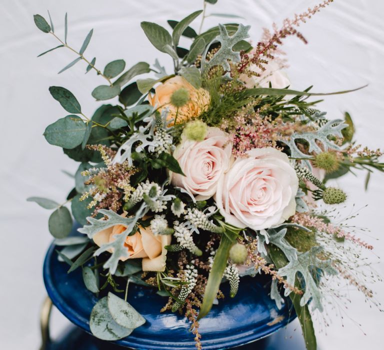 Pink and peach flower display at Wales wedding venue