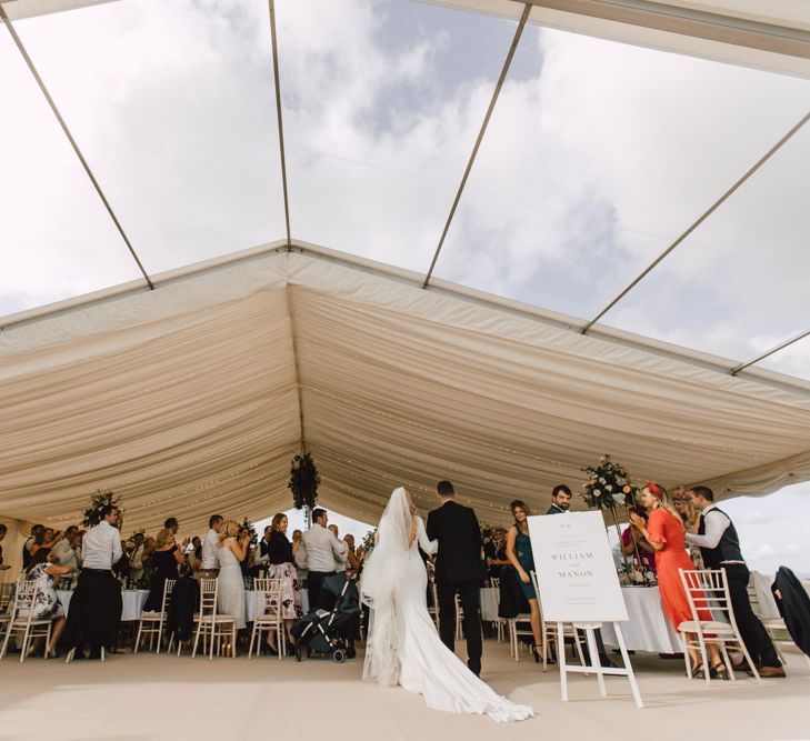 Marquee reception at Wales wedding venue in September with equestrian details