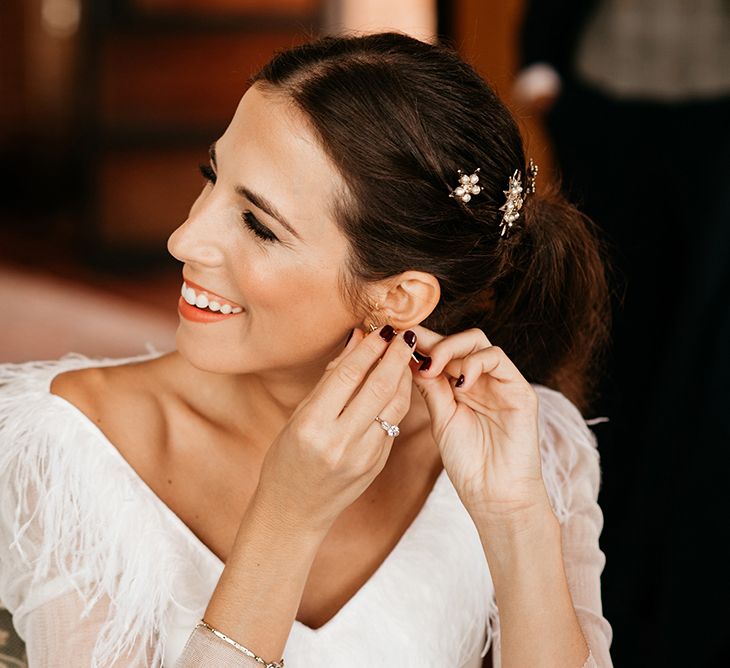 Bride in Sole Alonso Feather Trim Wedding Dress | Malaga Destination Wedding | Sara Lobla Photography | Un Par de Medias Film