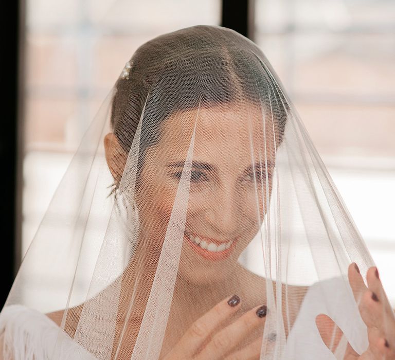 Bride in Sole Alonso Feather Trim Wedding Dress | Malaga Destination Wedding | Sara Lobla Photography | Un Par de Medias Film