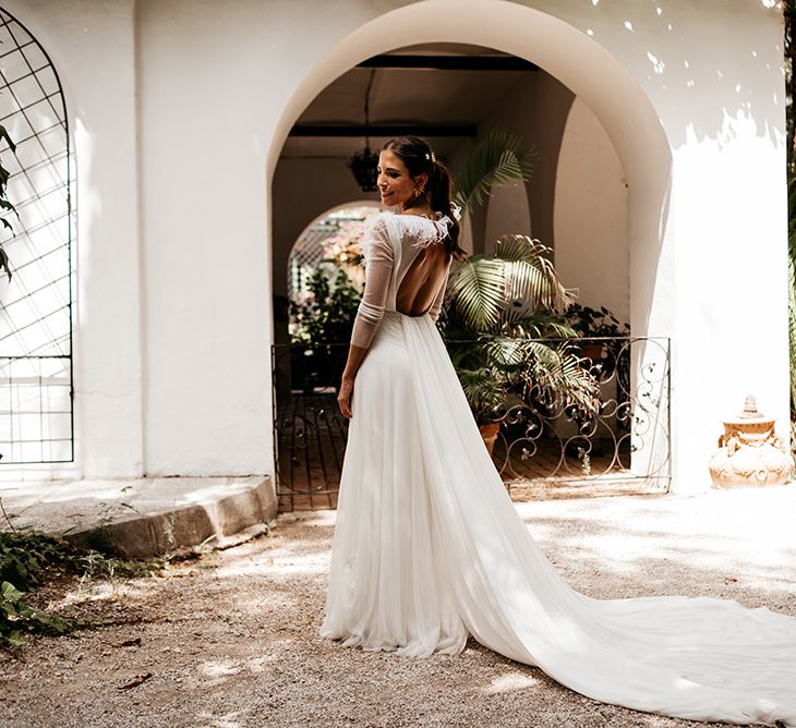 Bride in Sole Alonso Feather Trim Wedding Dress | Malaga Destination Wedding | Sara Lobla Photography | Un Par de Medias Film