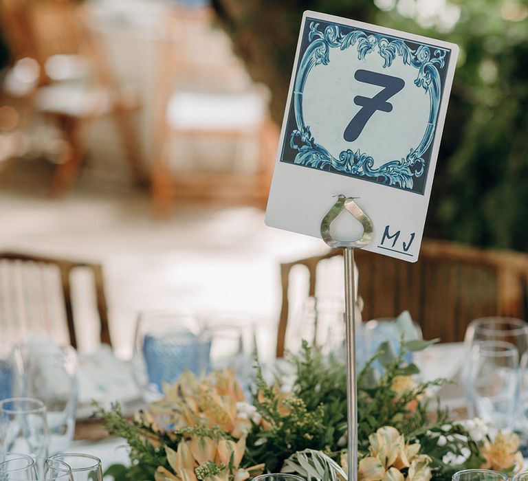 Blue Table Numbers On The Day Wedding Stationery Reception Decor | Malaga Destination Wedding | Sara Lobla Photography | Un Par de Medias Film