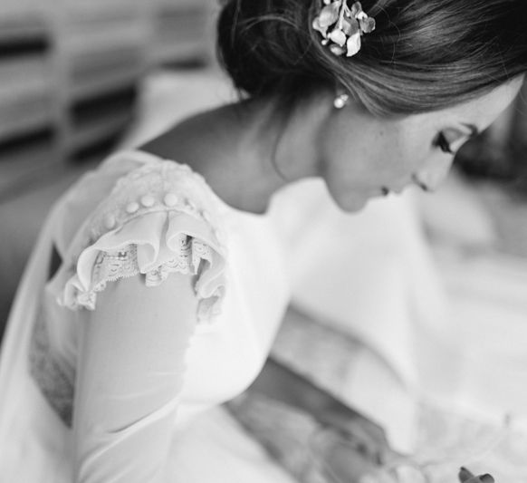 Stylish Wedding Dress with beautiful Back Detail from Beba’s Closet, for a Destination Wedding at Castillo de Viñuelas in Madrid, Spain | Lorena San José Photography