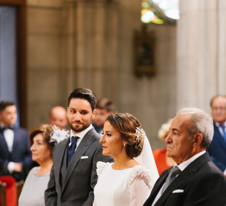 Stylish Wedding Dress with beautiful Back Detail from Beba’s Closet, for a Destination Wedding at Castillo de Viñuelas in Madrid, Spain | Lorena San José Photography