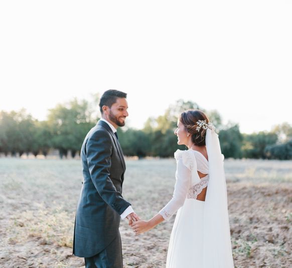 Stylish Wedding Dress with beautiful Back Detail from Beba’s Closet, for a Destination Wedding at Castillo de Viñuelas in Madrid, Spain | Lorena San José Photography