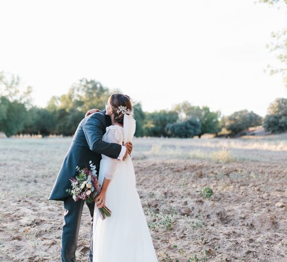 Stylish Wedding Dress with beautiful Back Detail from Beba’s Closet, for a Destination Wedding at Castillo de Viñuelas in Madrid, Spain | Lorena San José Photography