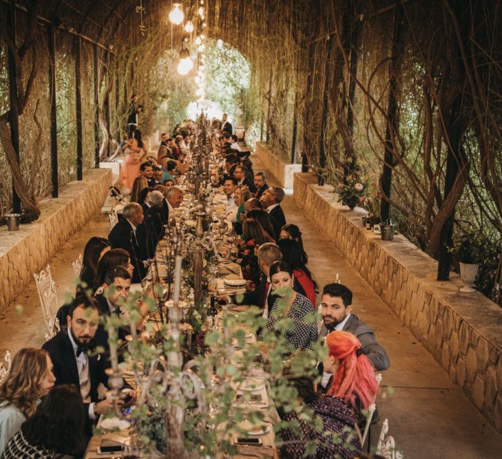 Guests enjoying wedding breakfast at Spanish wedding