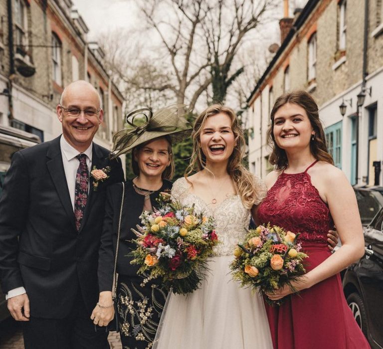 Bride portrait with her family