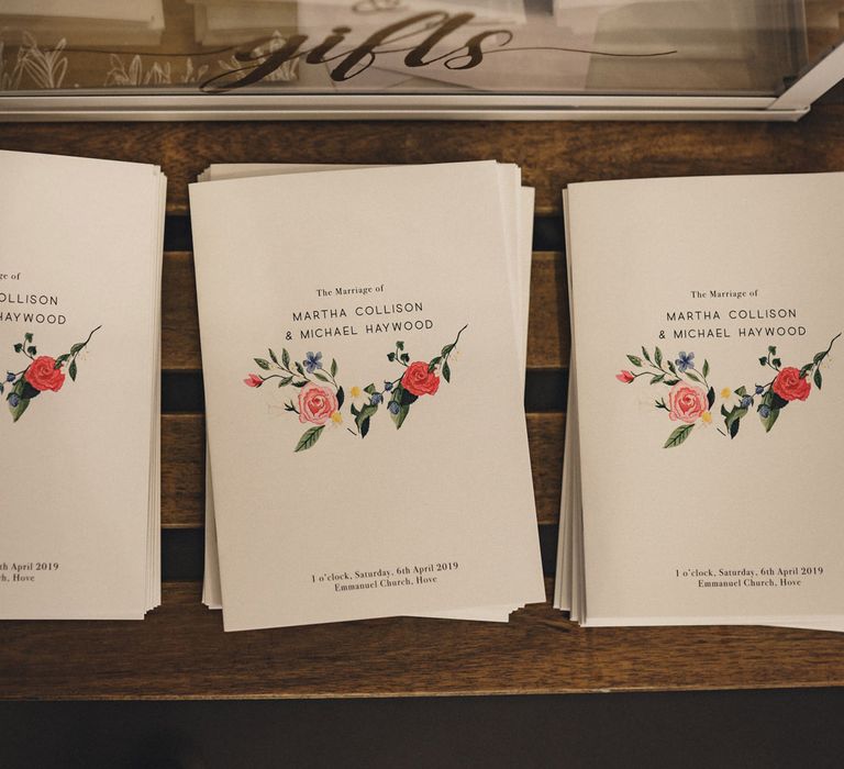 wedding order of service books with floral illustration