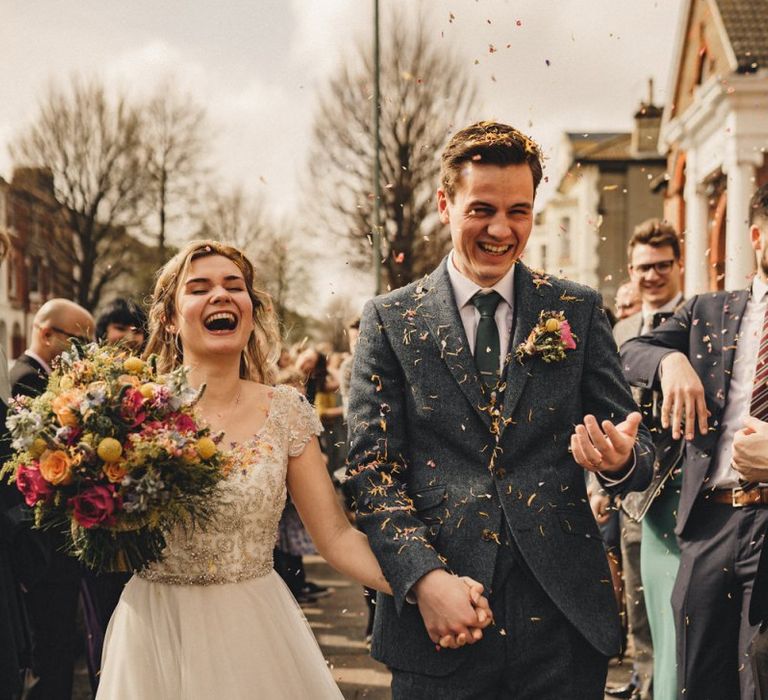 Bride and groom portrait by The Chamberlains Wedding and Photography