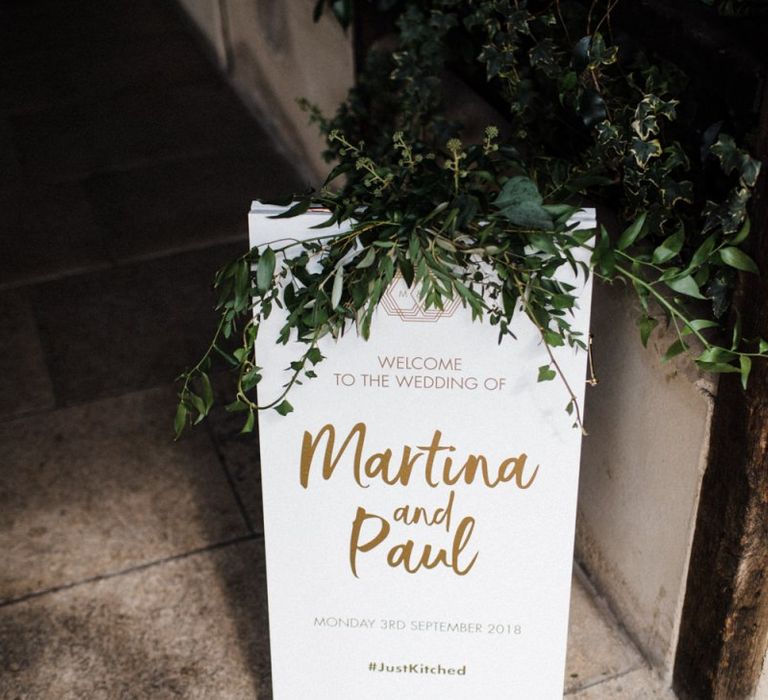 White and Gold Wedding Welcome Sign with Greenery Decor