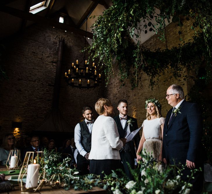 Wedding Ceremony at Stone Barn with Bride in Halfpenny London Swan Tulle Petal Bridal Skirt and Groom in Wool Suit and Bow Tie